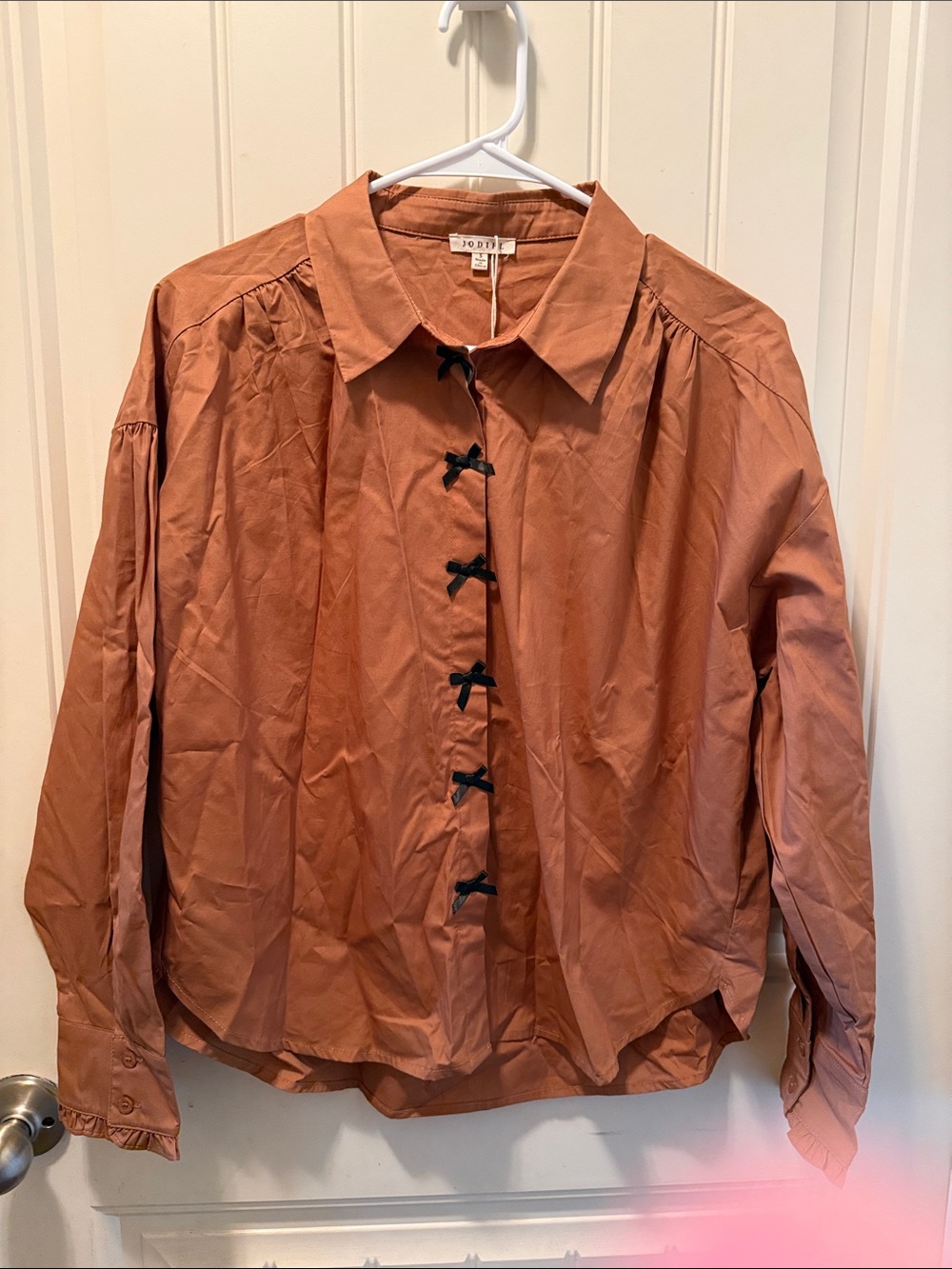 JODIFL Rust Orange Button-Front Blouse with Black Knot Details
